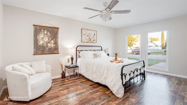 bedroom with wood-type flooring and ceiling fan