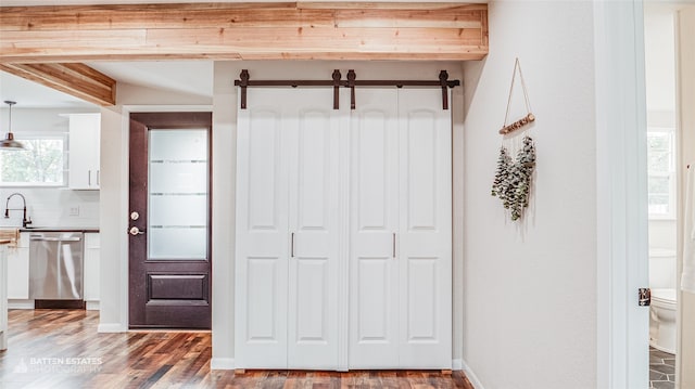 interior space featuring hardwood / wood-style floors and sink