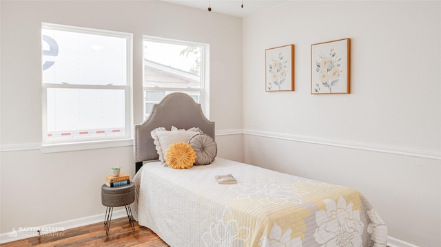 bedroom featuring hardwood / wood-style flooring