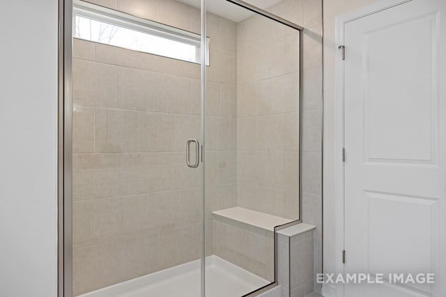 bathroom with an enclosed shower