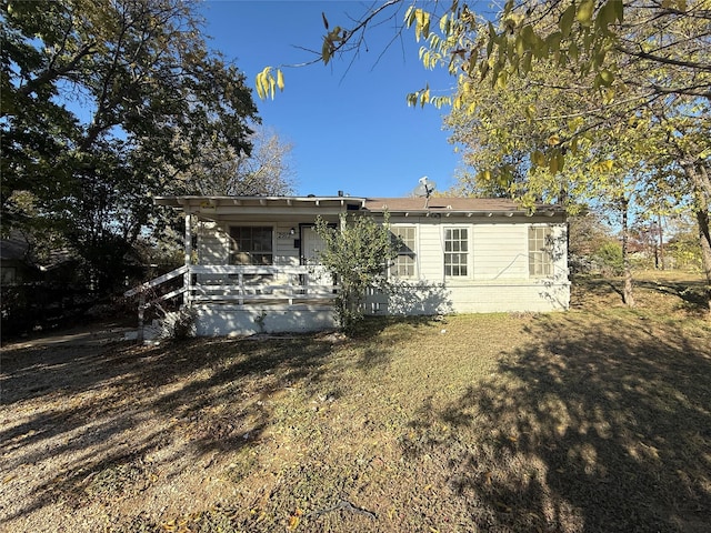 back of house with a porch