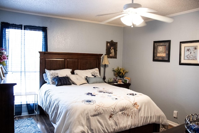 2010 Cloisters Dr Unit 2321, Arlington, TX 76011 - bedroom with a textured ceiling, ornamental molding, multiple windows, and wood finished floors
