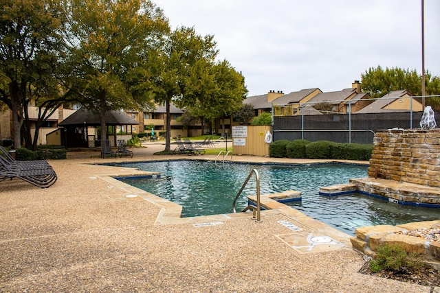 view of pool with a gazebo and a patio area