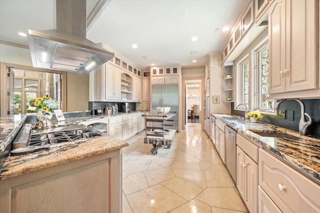 kitchen with backsplash, crown molding, stainless steel appliances, and island exhaust hood