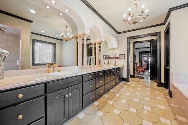 bathroom featuring ornamental molding, tile patterned flooring, vanity, and a notable chandelier