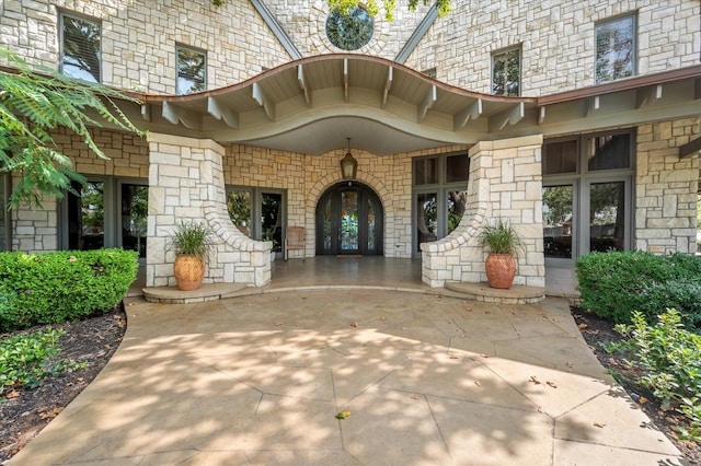 doorway to property featuring french doors