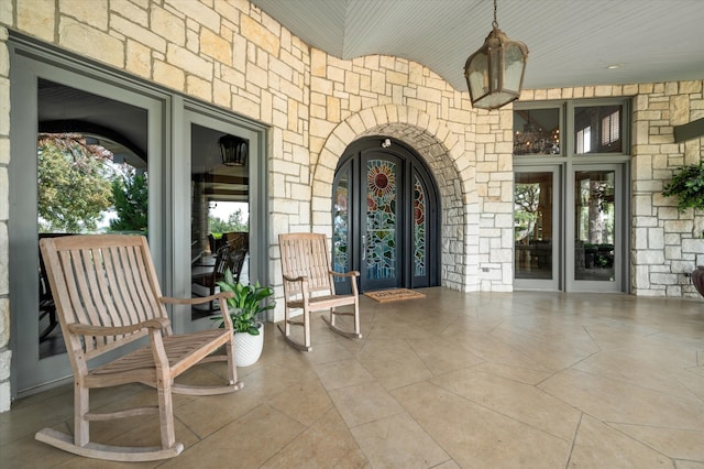 interior space with covered porch