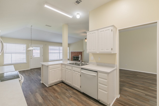 kitchen featuring dishwasher, sink, white cabinets, and kitchen peninsula