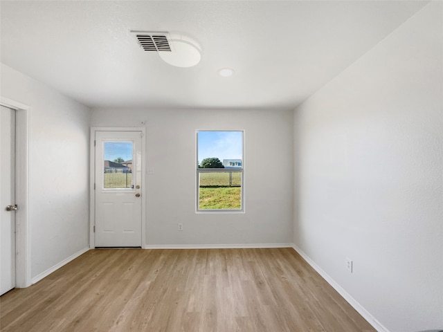 empty room featuring light hardwood / wood-style flooring