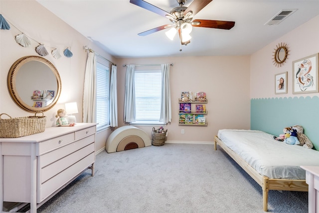 bedroom with light carpet and ceiling fan