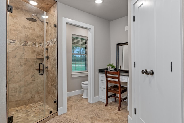 bathroom with toilet and walk in shower