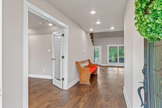 foyer with dark hardwood / wood-style flooring