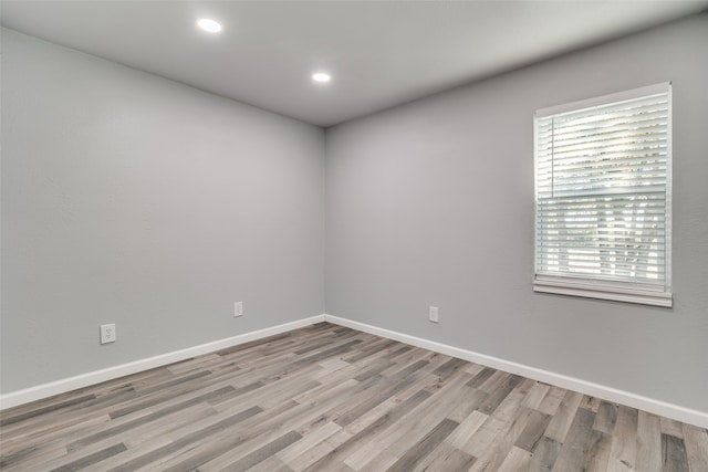 unfurnished room featuring light hardwood / wood-style flooring