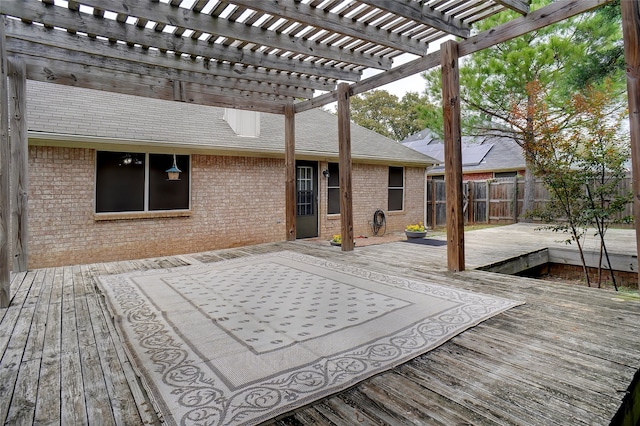 wooden terrace with a pergola