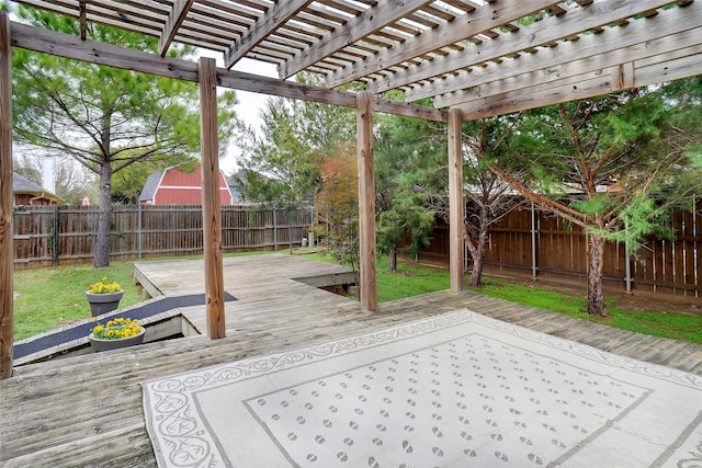 view of patio with a pergola and a wooden deck