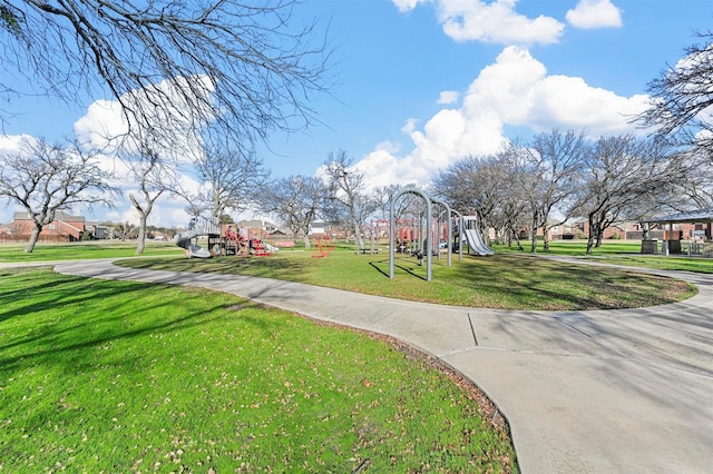 view of play area with a yard