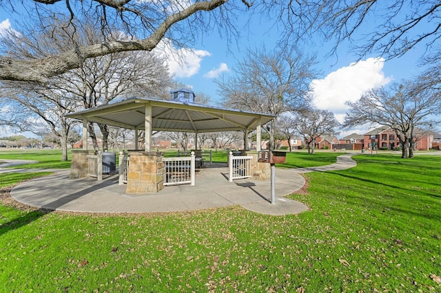 view of property's community featuring a gazebo and a yard