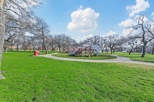 surrounding community with a playground and a yard