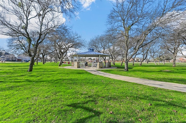 view of community featuring a gazebo and a lawn