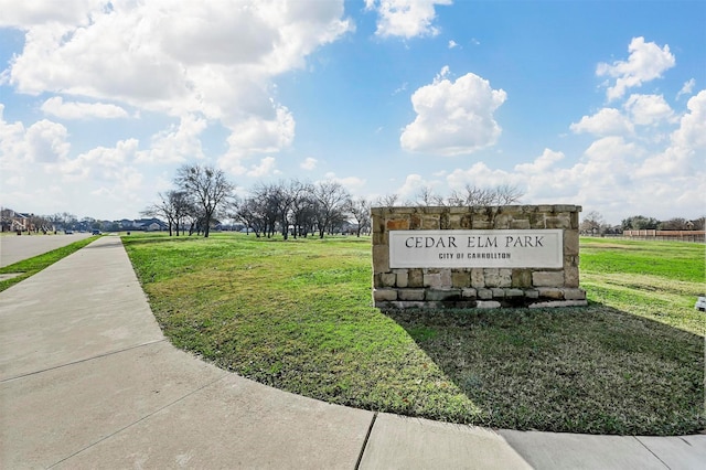 view of community featuring a yard