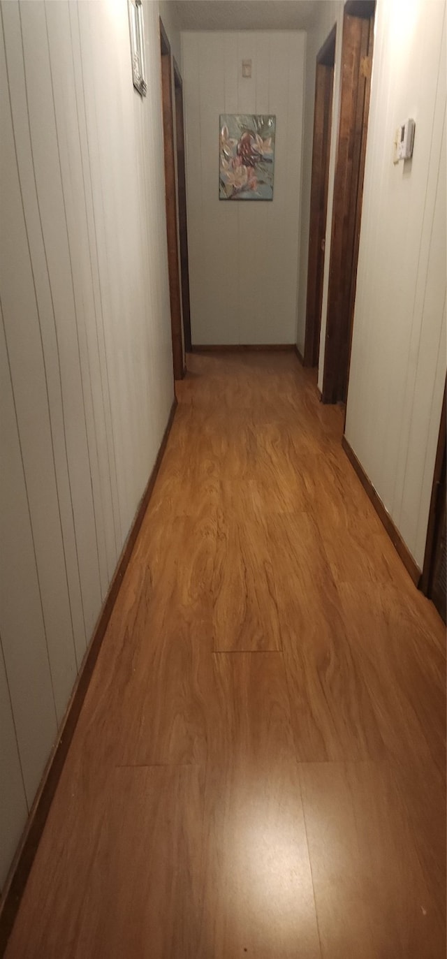 corridor featuring light hardwood / wood-style flooring