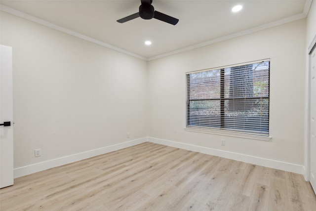 empty room with ceiling fan, light hardwood / wood-style floors, and ornamental molding