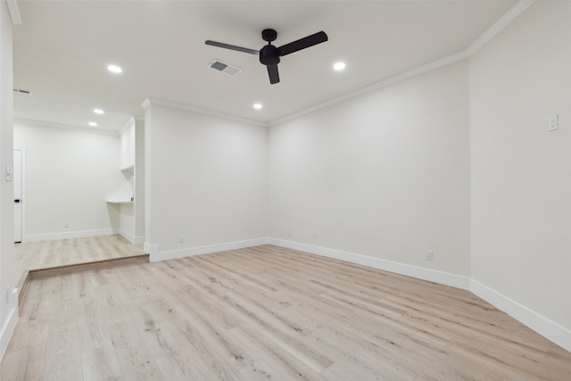 unfurnished room featuring light wood-type flooring, ceiling fan, and ornamental molding