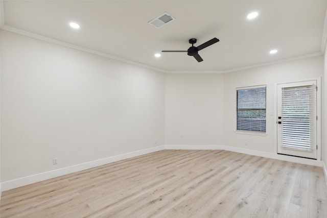 spare room featuring ceiling fan, light hardwood / wood-style flooring, and ornamental molding