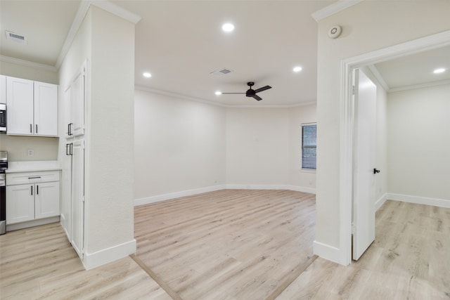 interior space featuring light hardwood / wood-style floors, ceiling fan, and crown molding