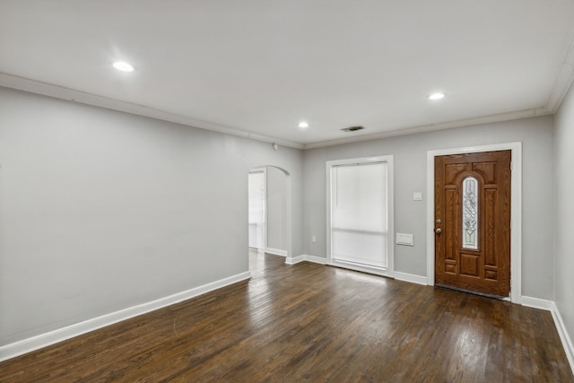 entrance foyer featuring dark hardwood / wood-style flooring and ornamental molding