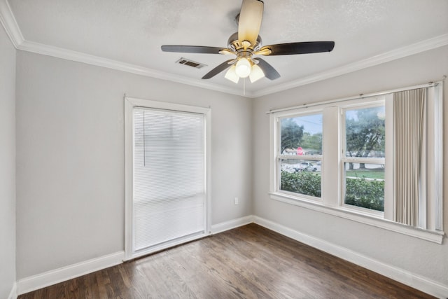 unfurnished room featuring crown molding, dark hardwood / wood-style flooring, and ceiling fan