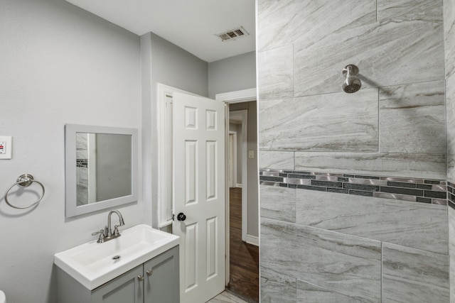 bathroom featuring vanity and wood-type flooring