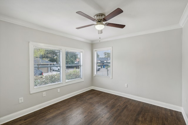 spare room featuring ceiling fan, ornamental molding, and dark wood-type flooring