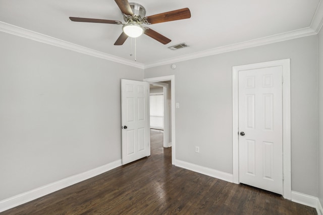 unfurnished bedroom with ceiling fan, dark hardwood / wood-style flooring, and crown molding