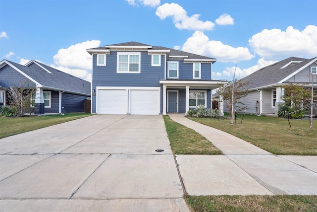 front of property with a front yard and a garage