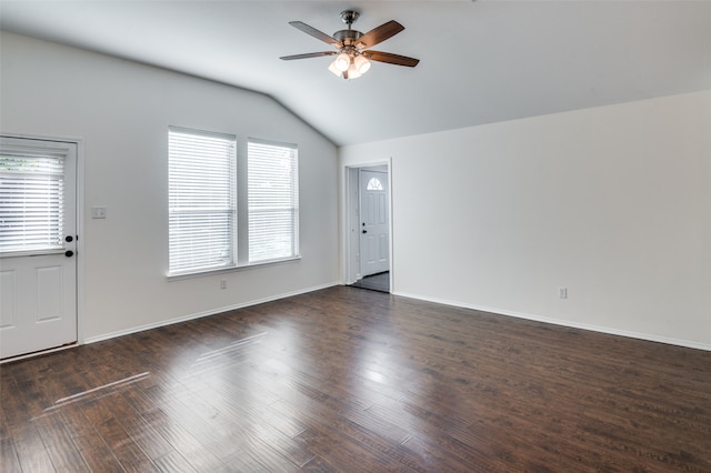 interior space with dark wood-type flooring, ceiling fan, and lofted ceiling