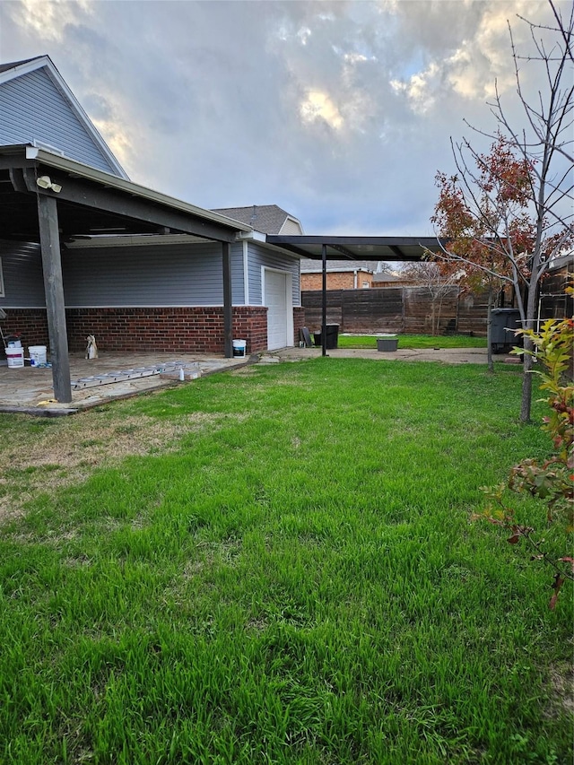 view of yard with a garage