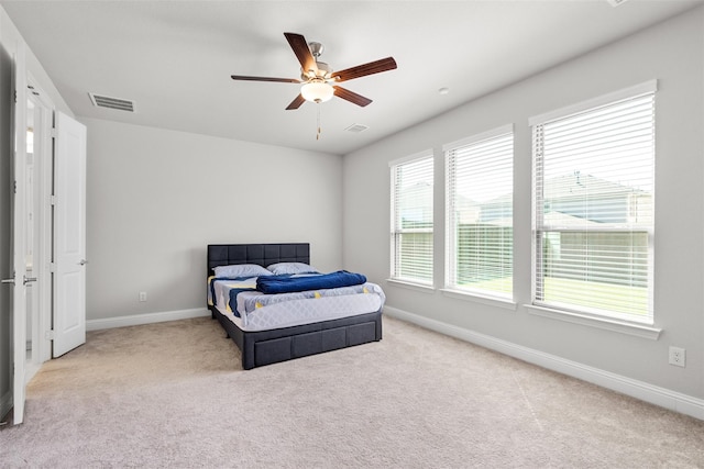 bedroom with carpet and ceiling fan