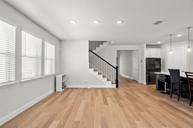 living room with light wood-type flooring