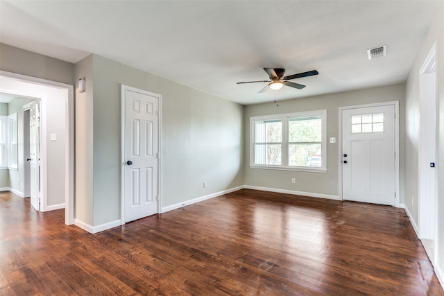 foyer with dark wood-type flooring and ceiling fan