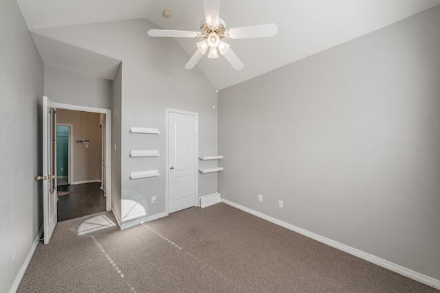 unfurnished bedroom featuring high vaulted ceiling, carpet floors, and ceiling fan