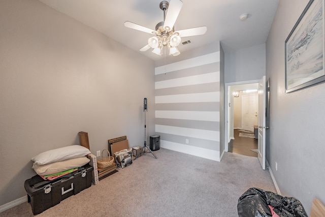 miscellaneous room featuring carpet floors and ceiling fan