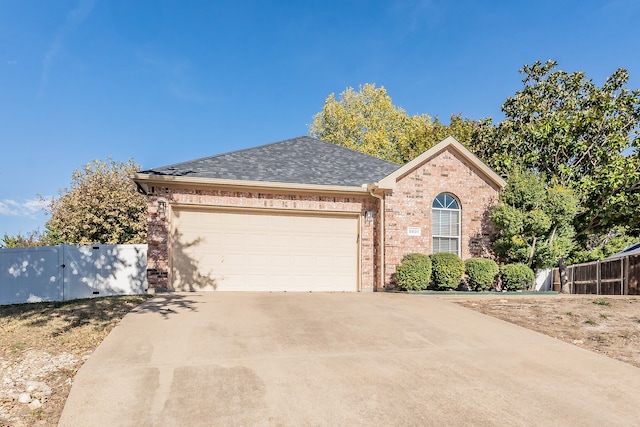 view of front of property featuring a garage