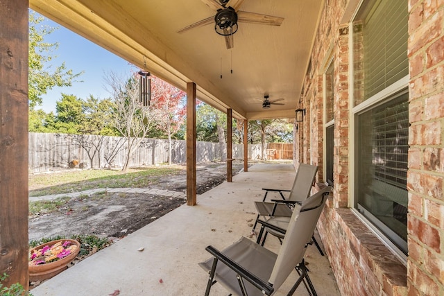 view of patio featuring ceiling fan