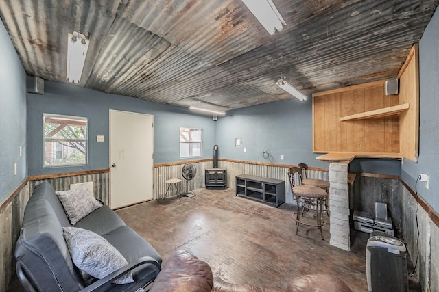 living room featuring a wood stove