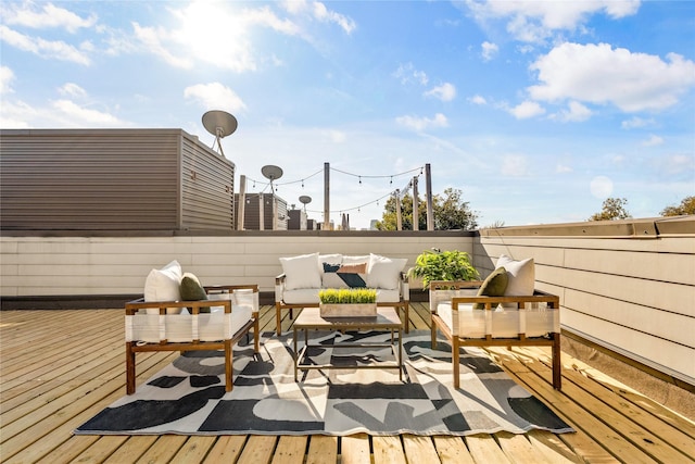 wooden deck featuring an outdoor living space