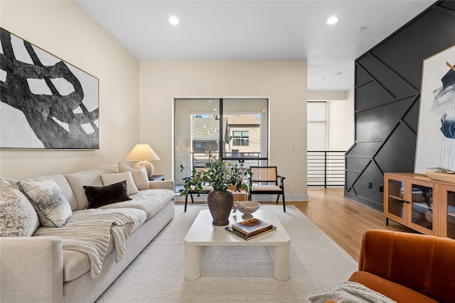 living room with light hardwood / wood-style flooring