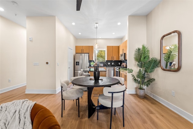 dining room featuring light hardwood / wood-style floors