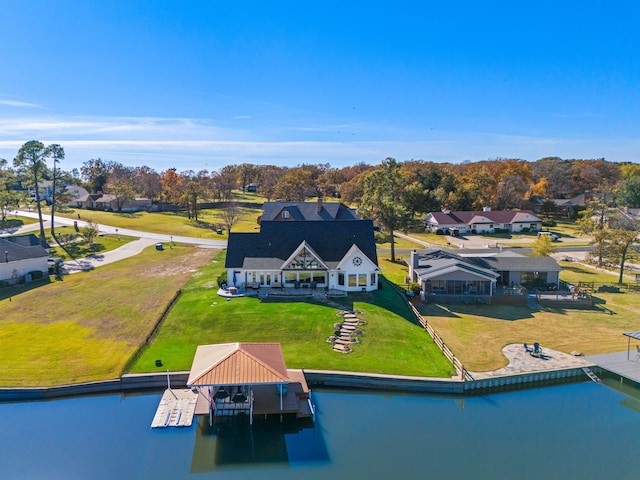 drone / aerial view with a water view