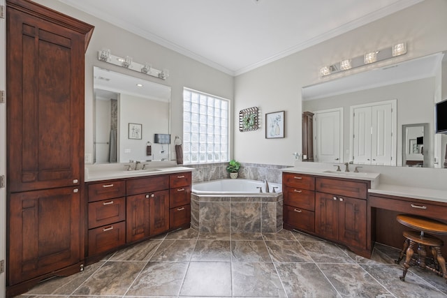 bathroom featuring two vanities, a sink, a bath, and crown molding